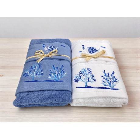 Fish and coral embroidery detail on blue terry towel